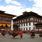 Masked dance in the courtyard of Thimphu Dzong